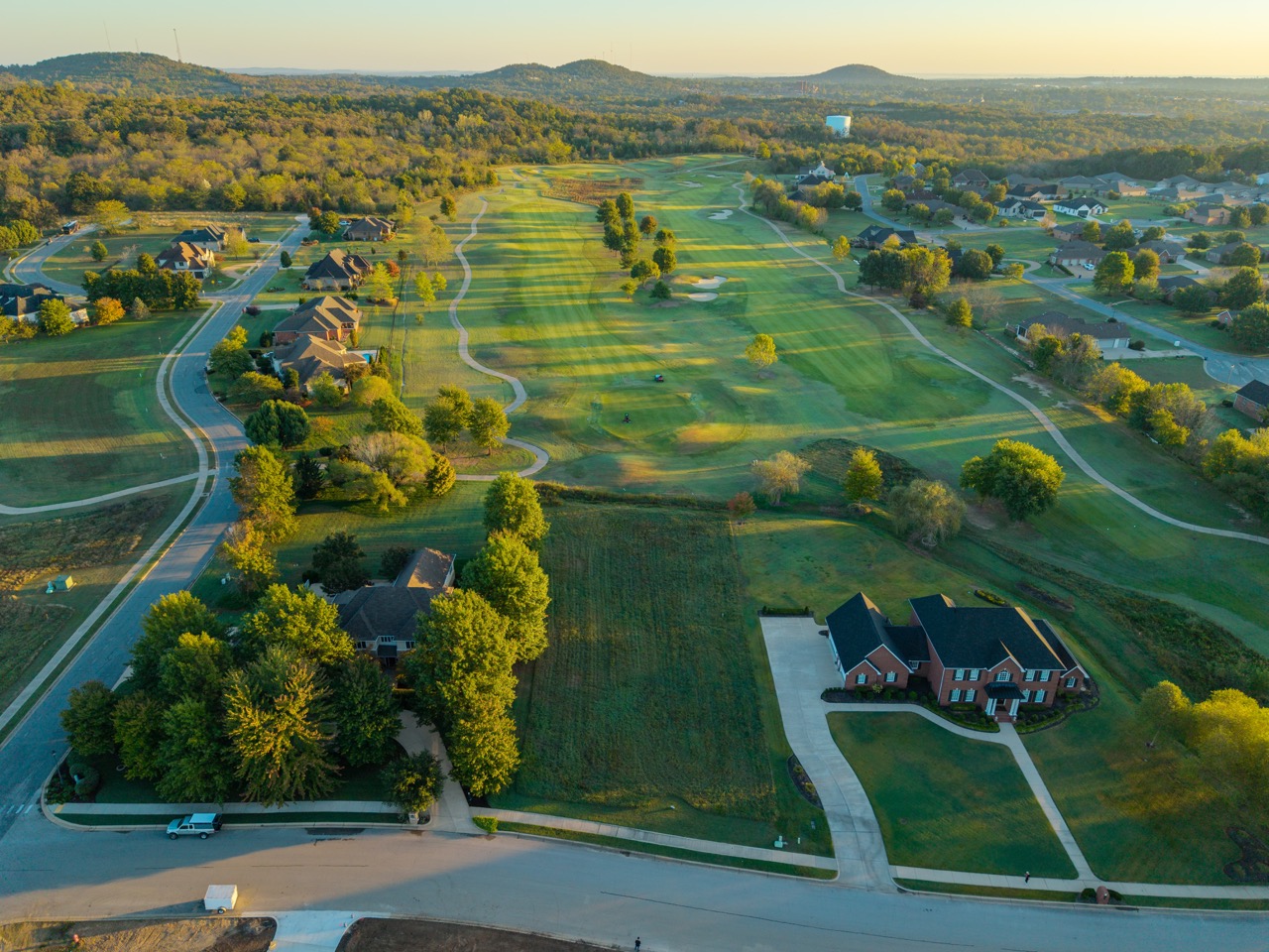 Golf course with neighboring suburban homes
