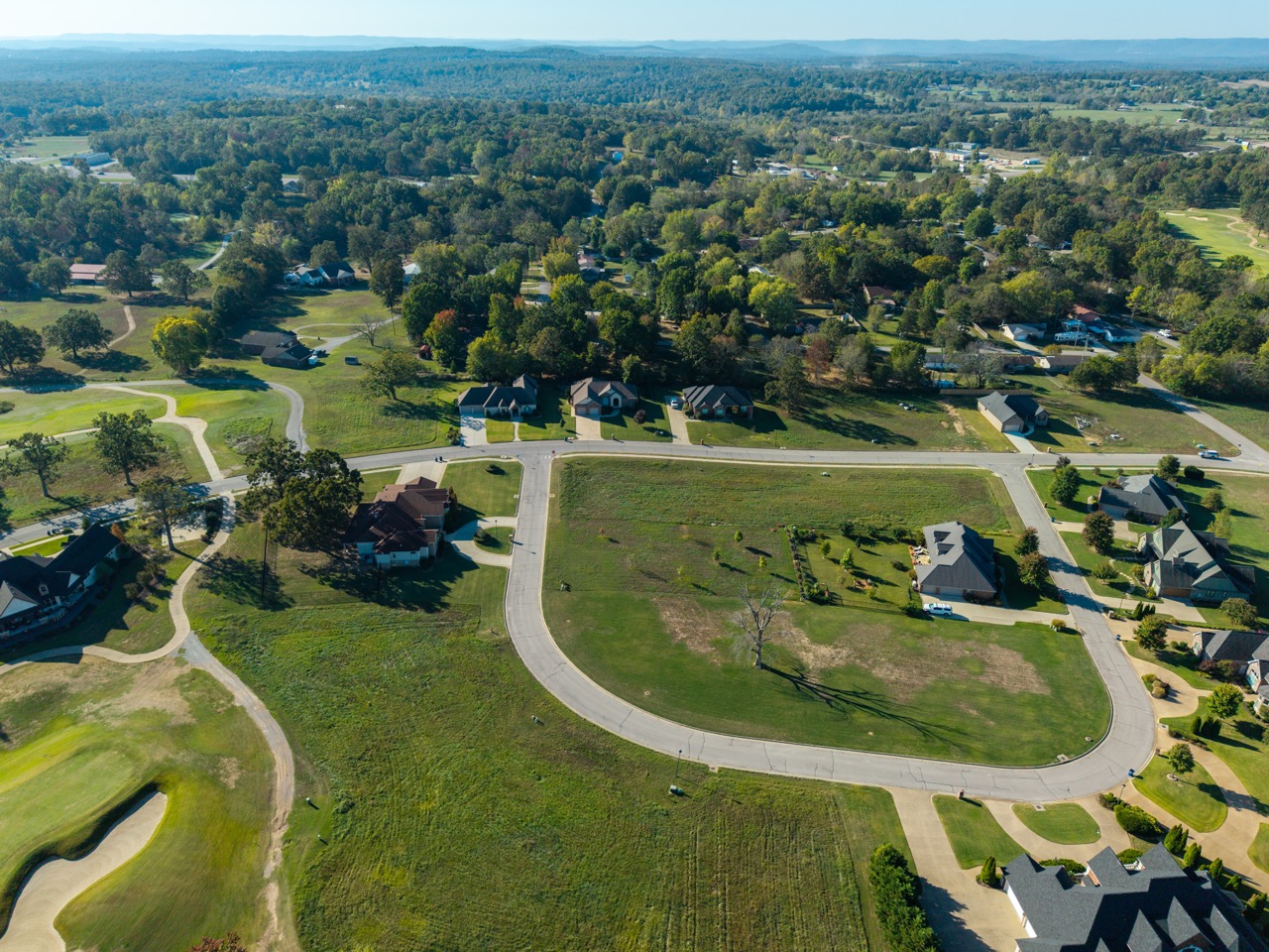 Aerial view of suburban cul-de-sac and surrounding houses