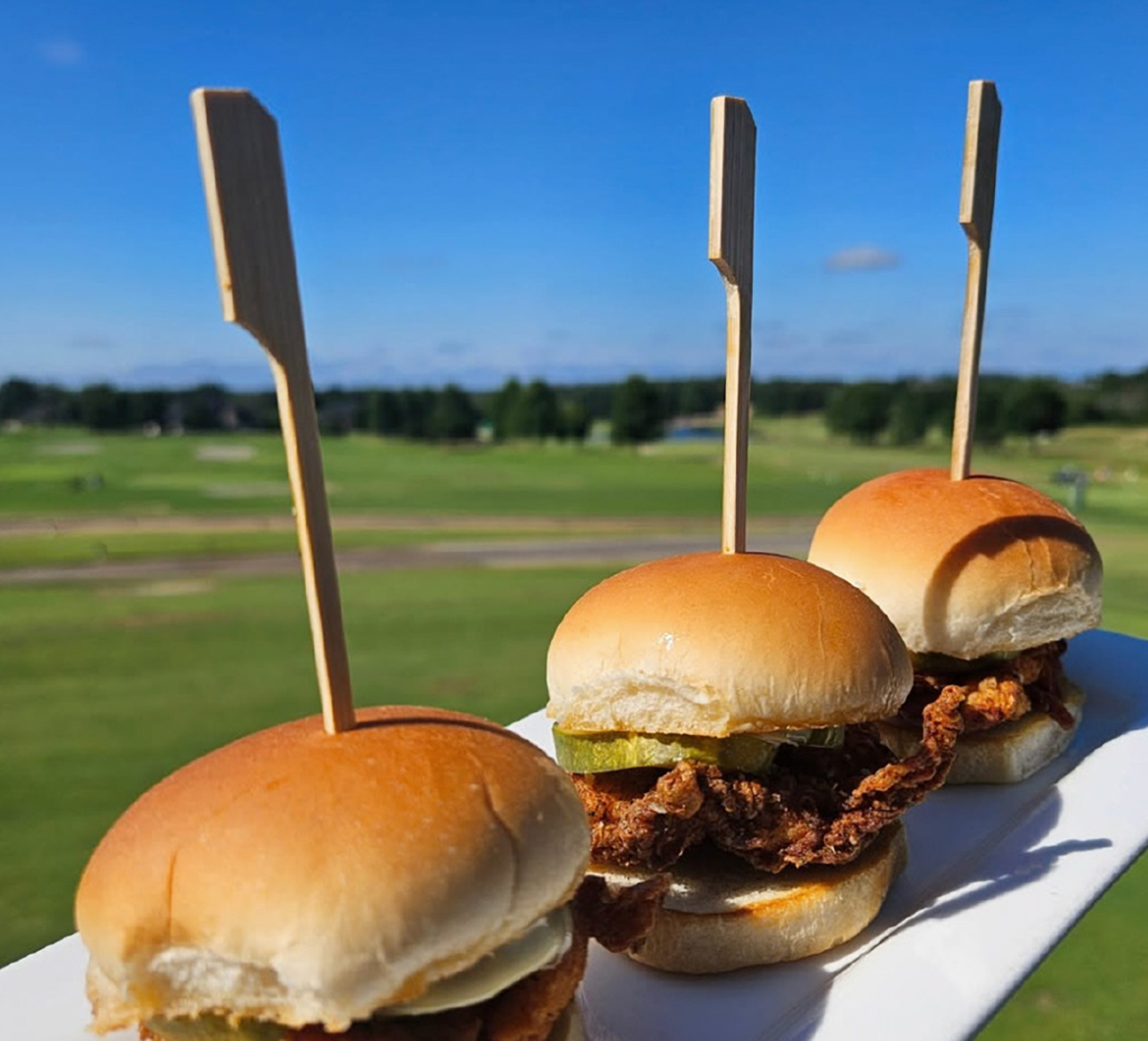 Three fried chicken sliders